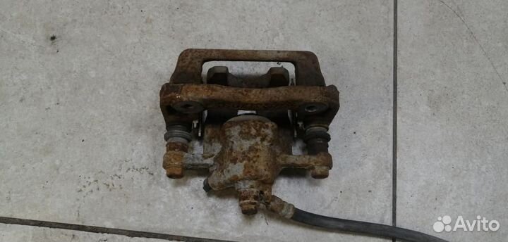 Суппорт задний левый Kia Soul AM 2009-2014