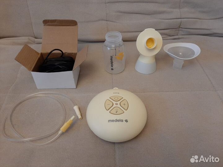 Молокоотсос medela swing электрический