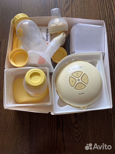 Молокоотсос medela swing электрический