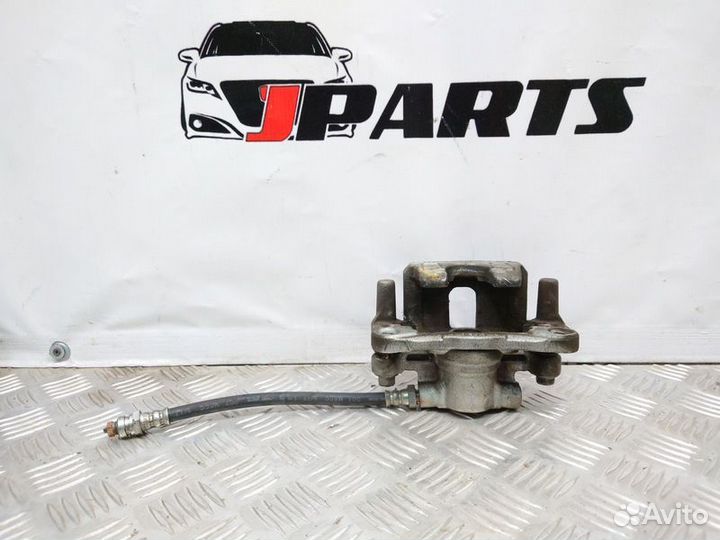 Суппорт задний левый Mitsubishi Lancer 10