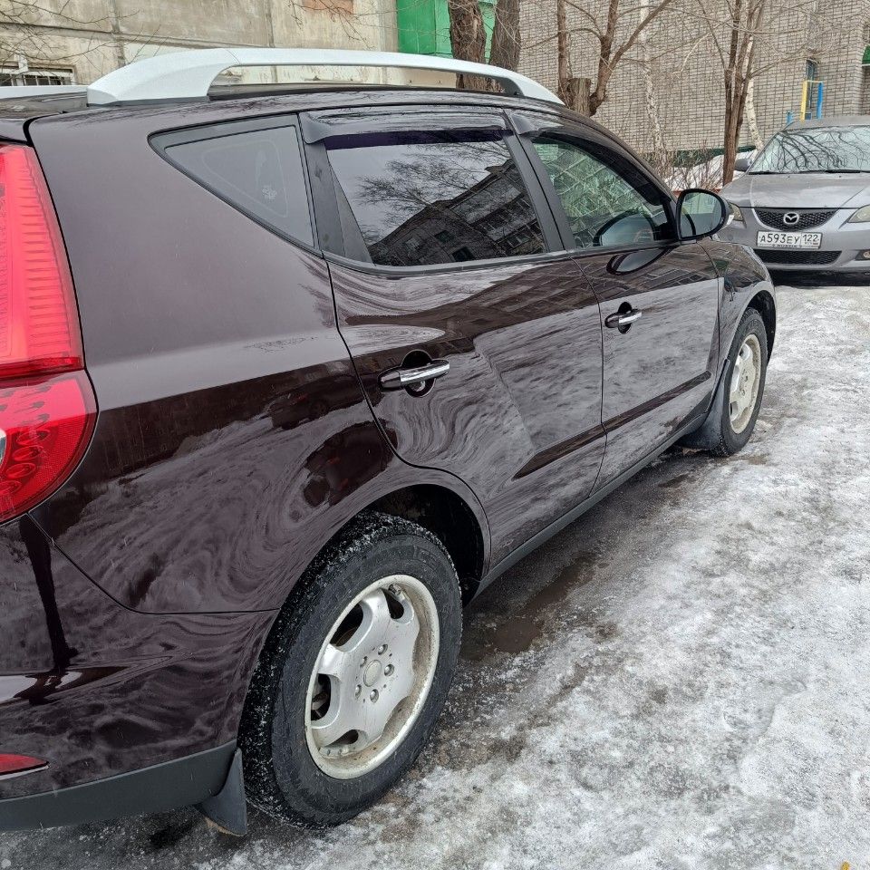 Geely Emgrand X7: фото владельца