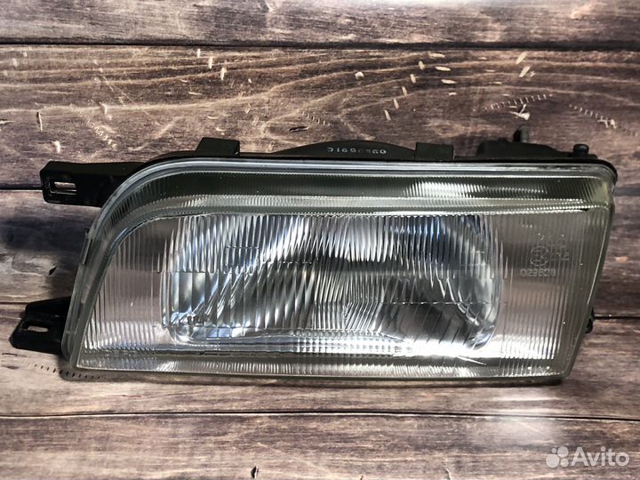 Передняя левая фара на Nissan Sunny N14