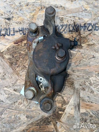 Суппорт тормозной передний левый Hyundai Poni G4DJ