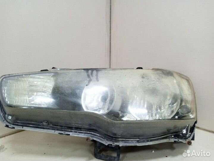Фара передняя левая Mitsubishi Lancer