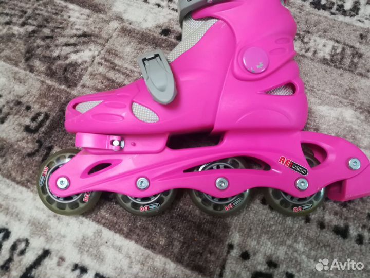 Роликовые коньки