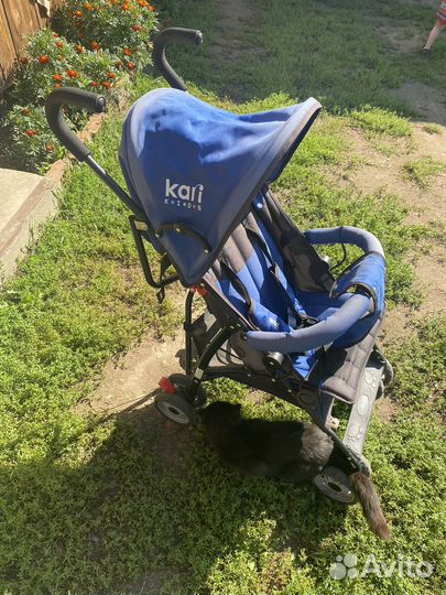 Прогулочная коляска трость