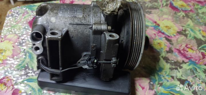 Компрессор кондиционера Lancer Cedia