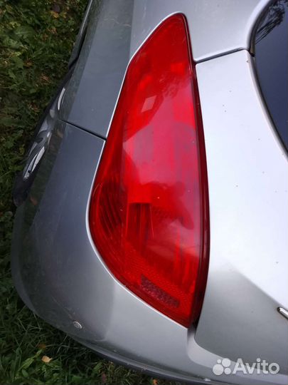 Фонарь левый Peugeot 308