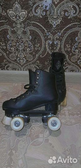 Роликовые коньки