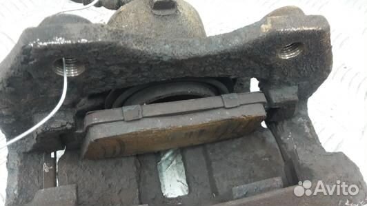 Суппорт тормозной передний левый nissan almera N16