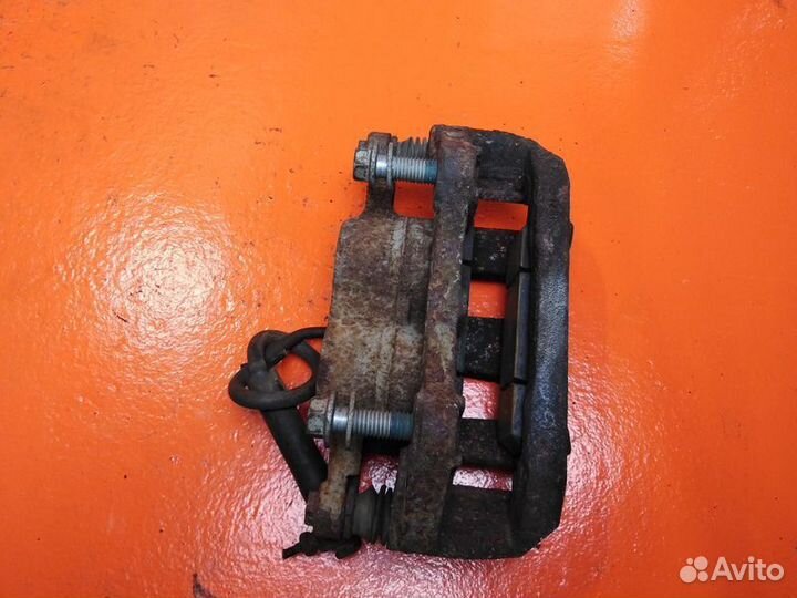 Суппорт тормозной передний левый Ford Explorer