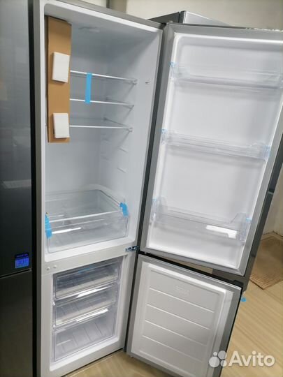 Новый холодильник серебристый 180 см