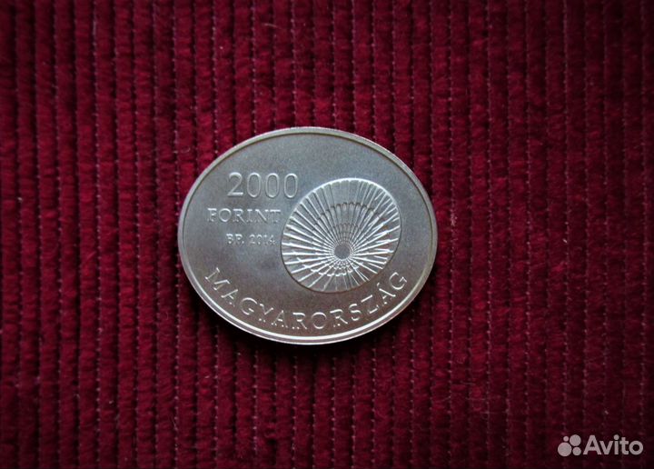 Монеты овальные