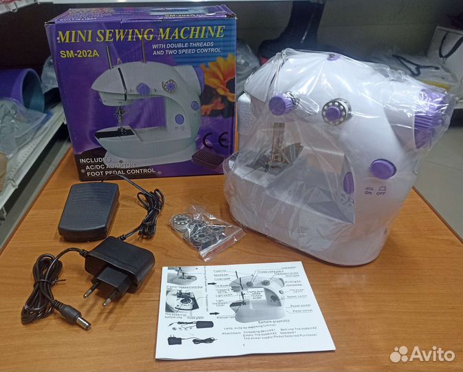 Портативная мини швейная машинка