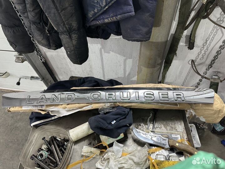 Эмблема Toyota land cruiser