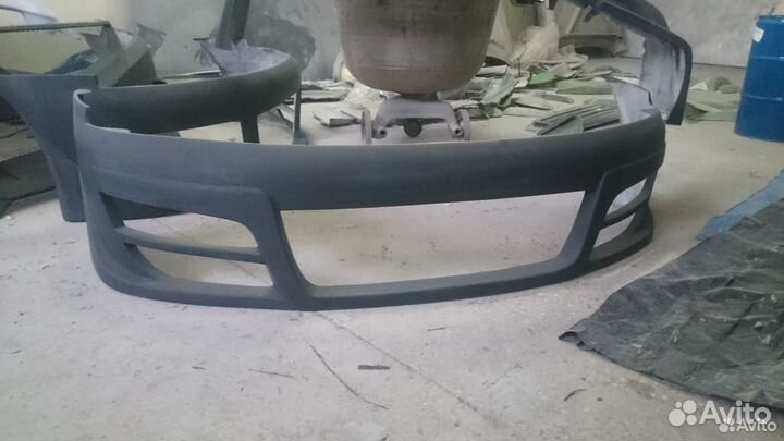 Бампер Каризма передний Mitsubishi Carisma тюнинг