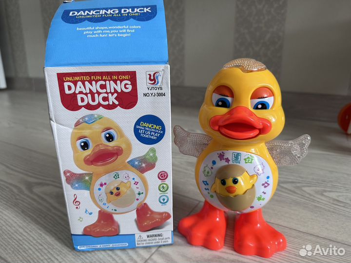 Развивающая музыкальная игрушка утка