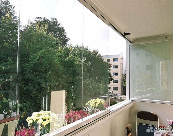 Безрамное раздвижное остекление