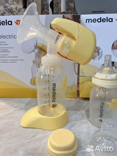 Молокоотсос medela электрический