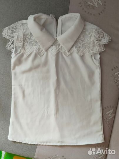 Блузки на девочку 128