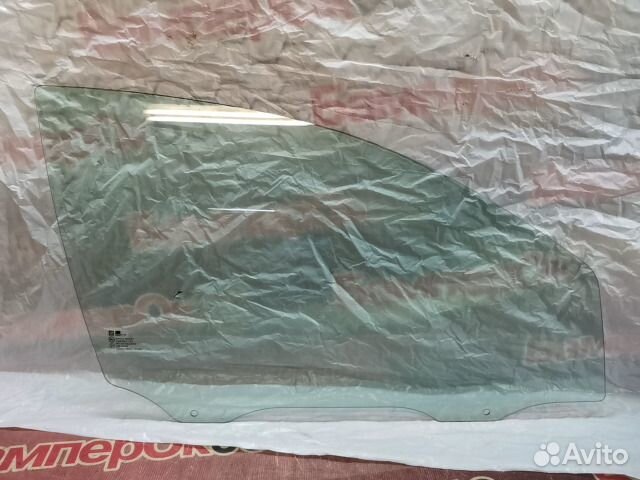 Стекло двери переднее правое Opel Astra J