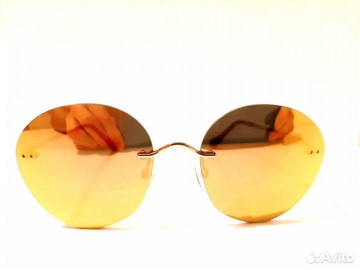 Солнцезащитные очки Toms