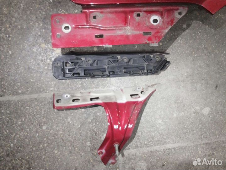 Кронштейн левого крыла Volkswagen Touran