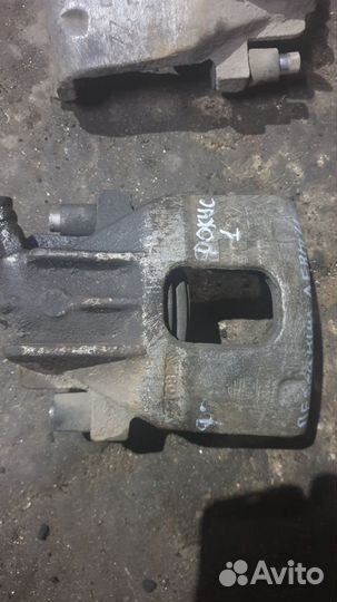 Суппорт передний левый Ford Focus 1