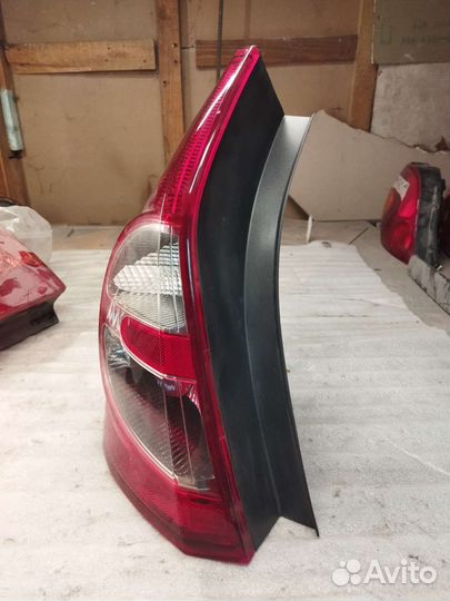 Фонарь левый Sandero 1 новый оригинал 8200734825