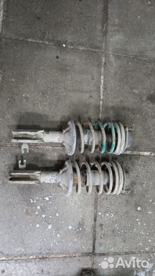 Стойки передние Mazda 323 BA