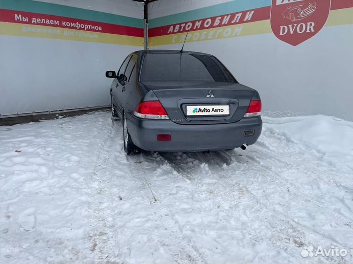 Mitsubishi Lancer 1.6 МТ, 2006, 303 000 км