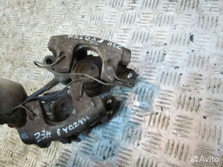 Суппорт тормозной задний для Мазда 3 бк бл