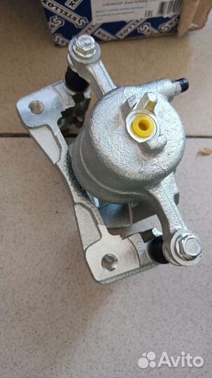 Суппорт тормозной передний левый в сборе