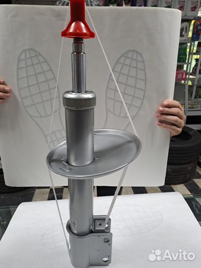 Амортизационные стойки передней подвески largus