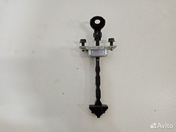 Ограничитель двери передний левый Mazda 3 BL