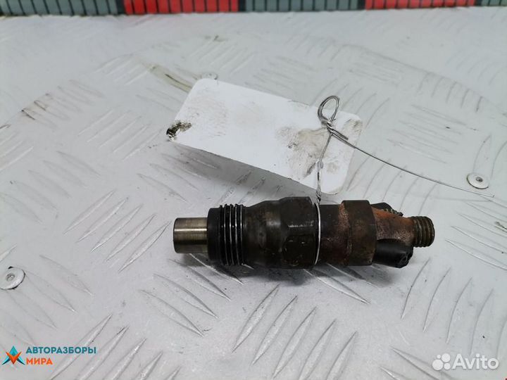 Форсунка Renault Laguna рест. 2001 7701033826