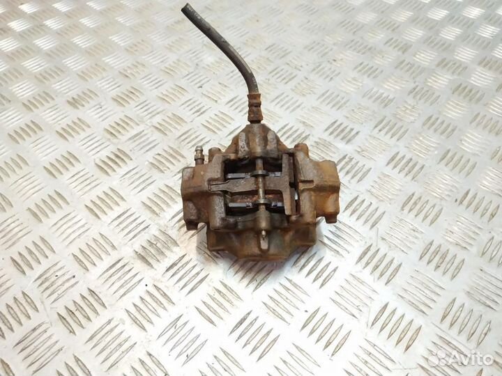 Суппорт тормозной задний левый Mercedes-Benz