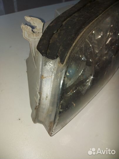 Фара левая с дефектами Kia Spectra