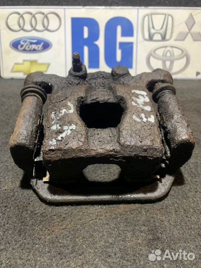 Суппорт задний левый Nissan Tiida HR16DE 2010