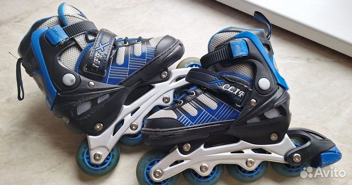 Коньки роликовые р-р 30-33 в рюкзаке