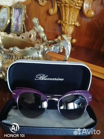 Солнечные очки женские