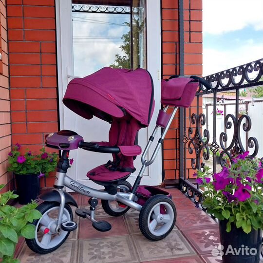 Велосипед трёхколёсный с ручкой