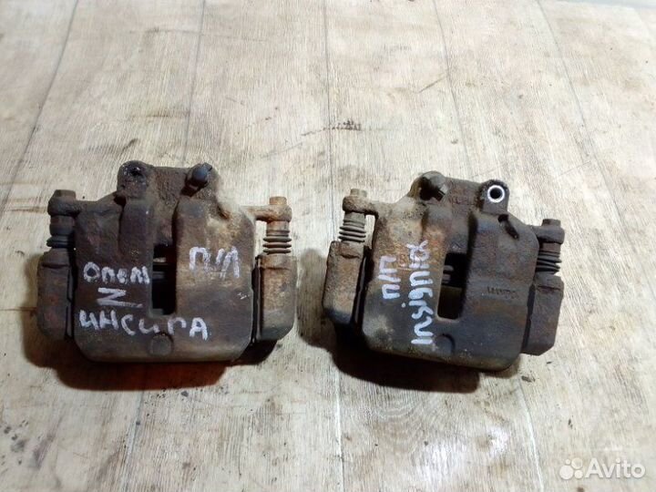 Суппорт тормозной передний Opel Insignia A16XER