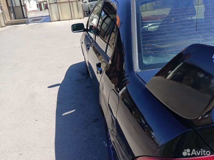 Mitsubishi Lancer Cedia 1.8 МТ, 2002, 100 000 км