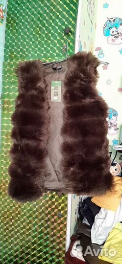 Жилетка меховая женская