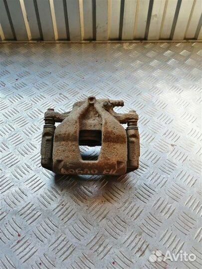 Суппорт тормозной передний левый Fiat Doblo 223