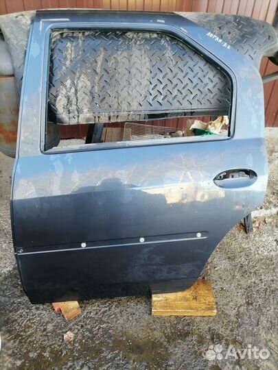 Дверь задняя правая левая Рено логан1