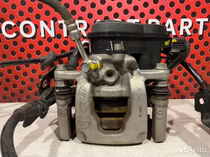 Суппорт задний правый Hyundai Tucson NX4 1.6T-GDI