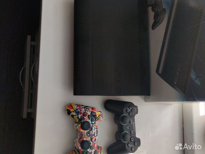 Ps3 super slim прошитая +два джостика+много игр