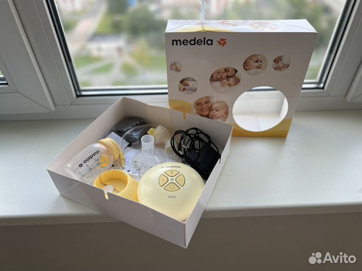 Молокоотсос Medela электрический